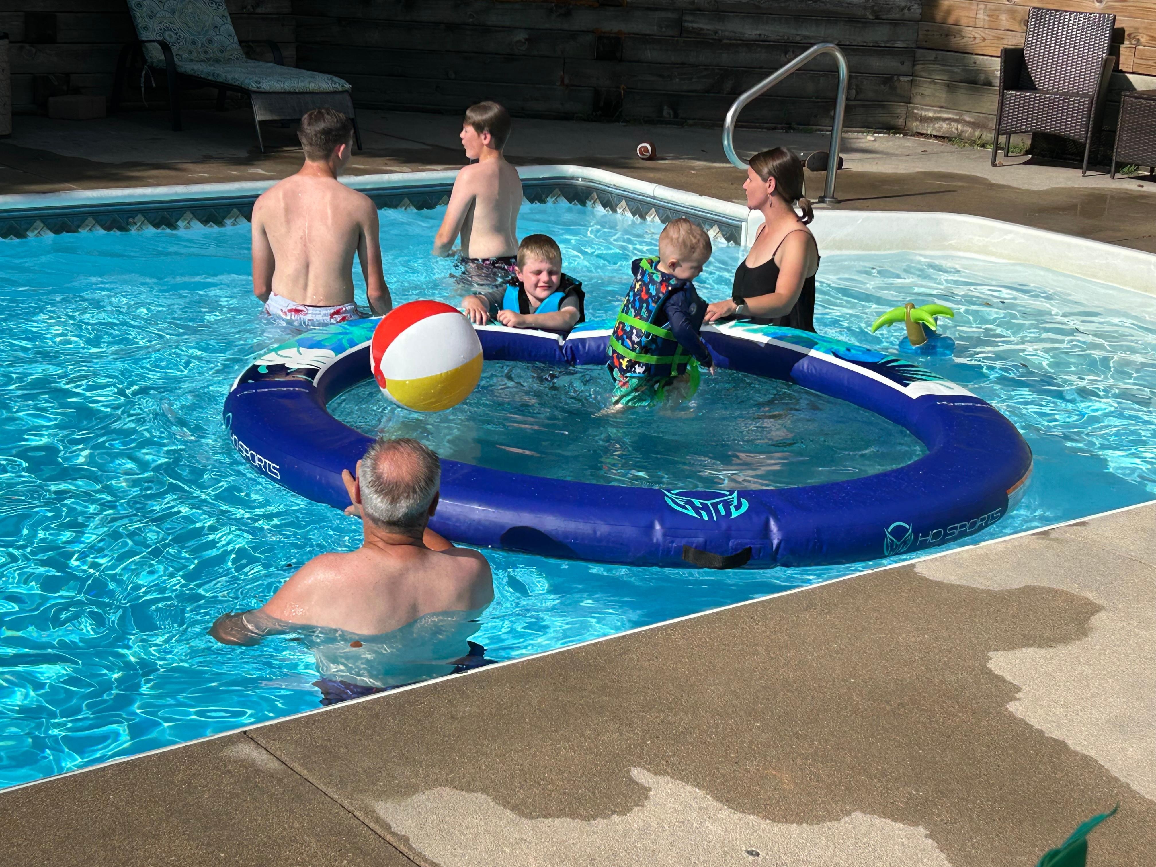 Family fun in the pool on a hot afternoon after the zoo! Fun for all ages!