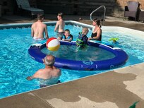 Family fun in the pool on a hot afternoon after the zoo! Fun for all ages!