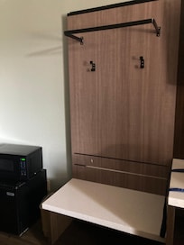 Place to hang my clothes too high for a person in a wheelchair to reach.