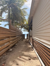 Pathway to the beach, just across the parking lot.