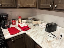 Counter top, crumbs in toaster