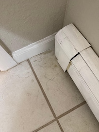 Hair on the bathroom floor.