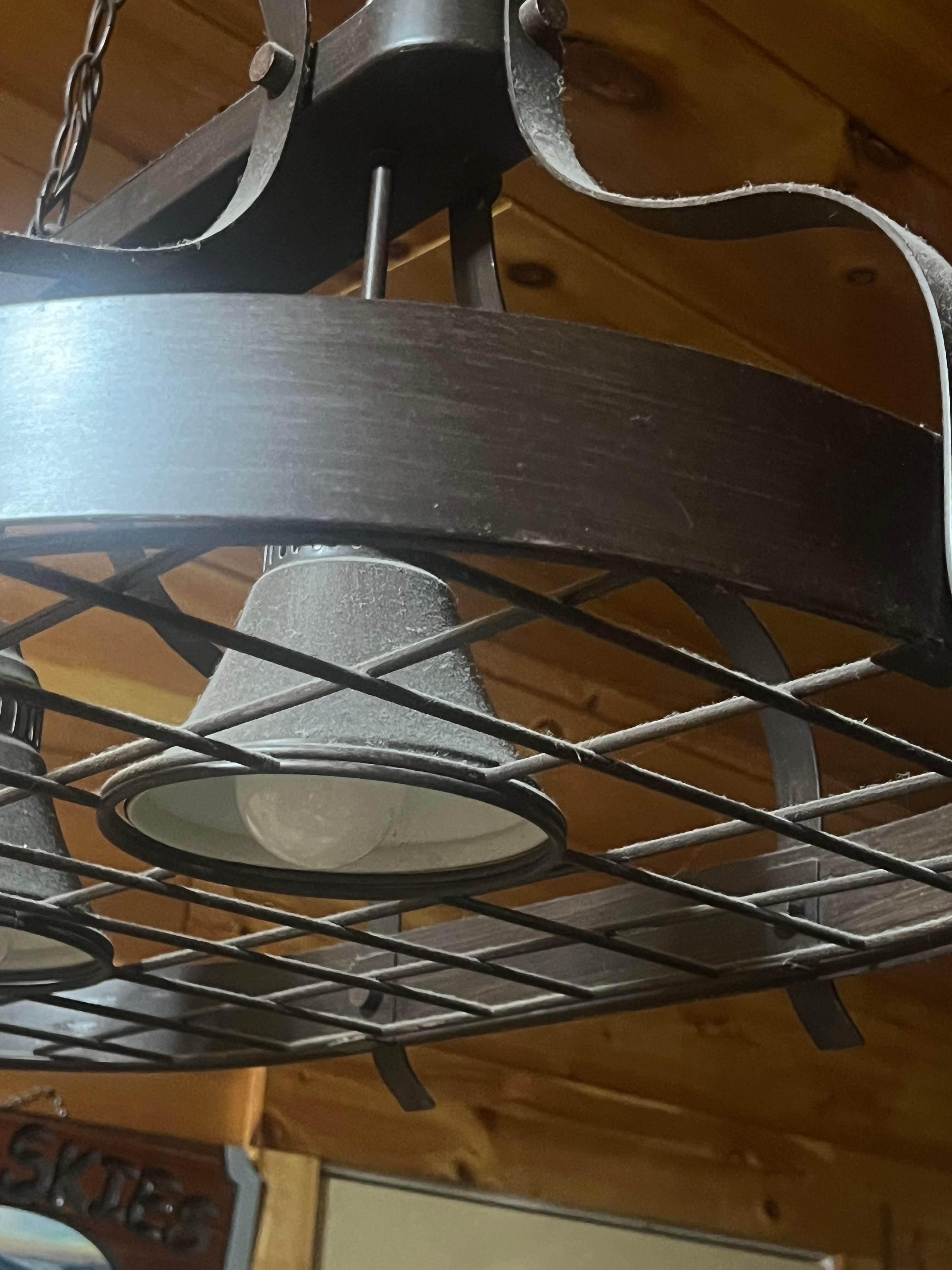 Grease and dust on the light above the kitchen counter 