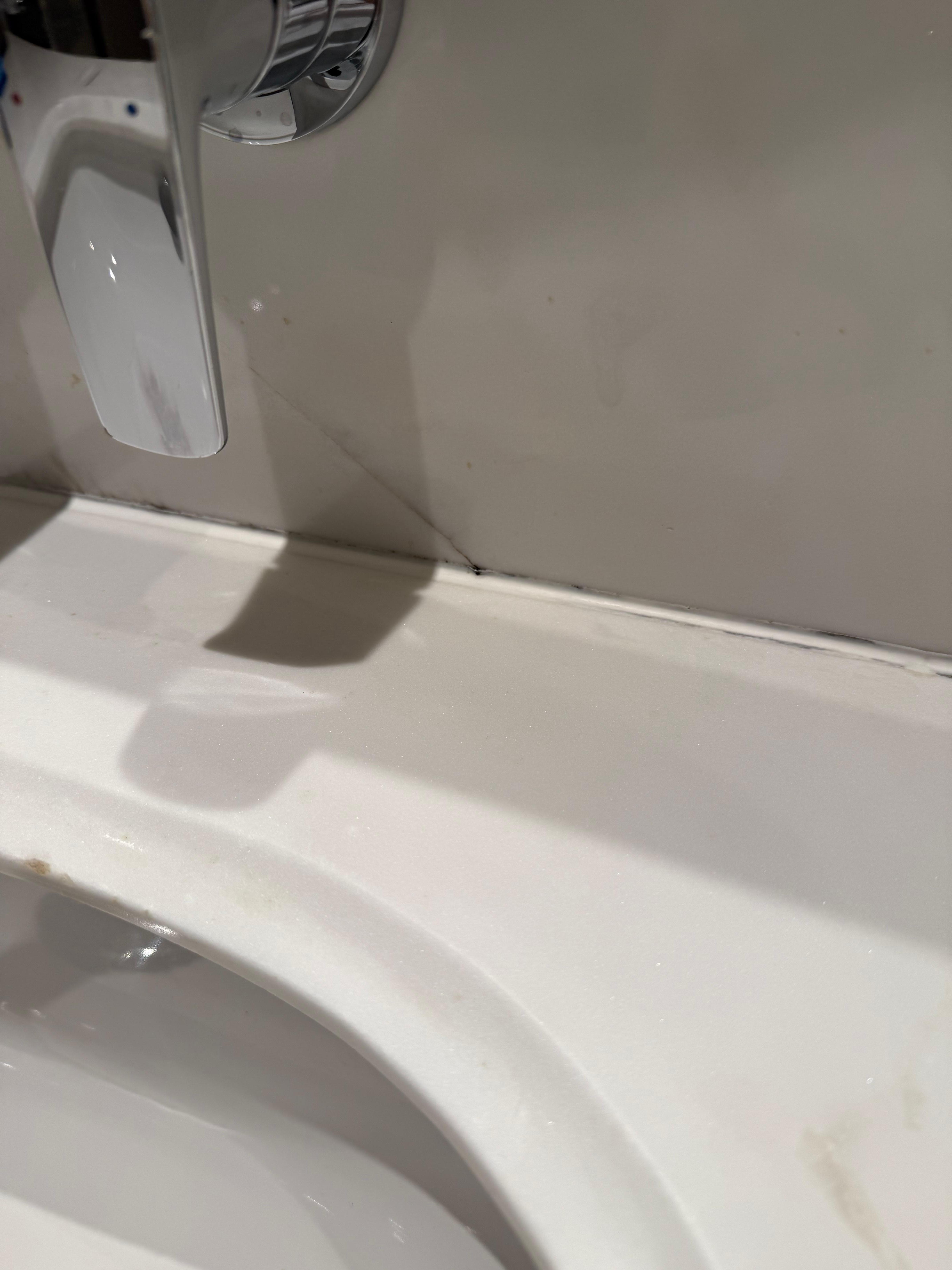 Stains in grout line at the sink 