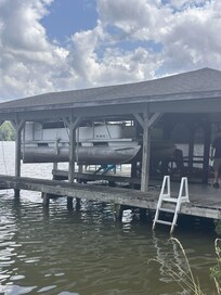 This is one side of the very splintery dock. It is in need of replacement/repair.