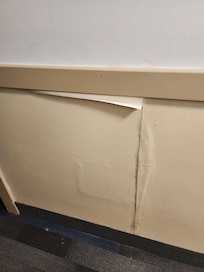 Wall paper coming off the walls