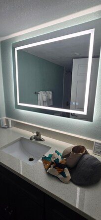 Fancy touch on lighted mirror