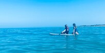 Paddle boarding on the beach