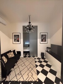The living room/second bedroom