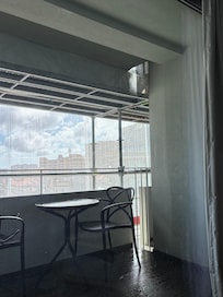 Jet washing the balcony above resulting in a huge amount of dirty water flowing onto the balcony