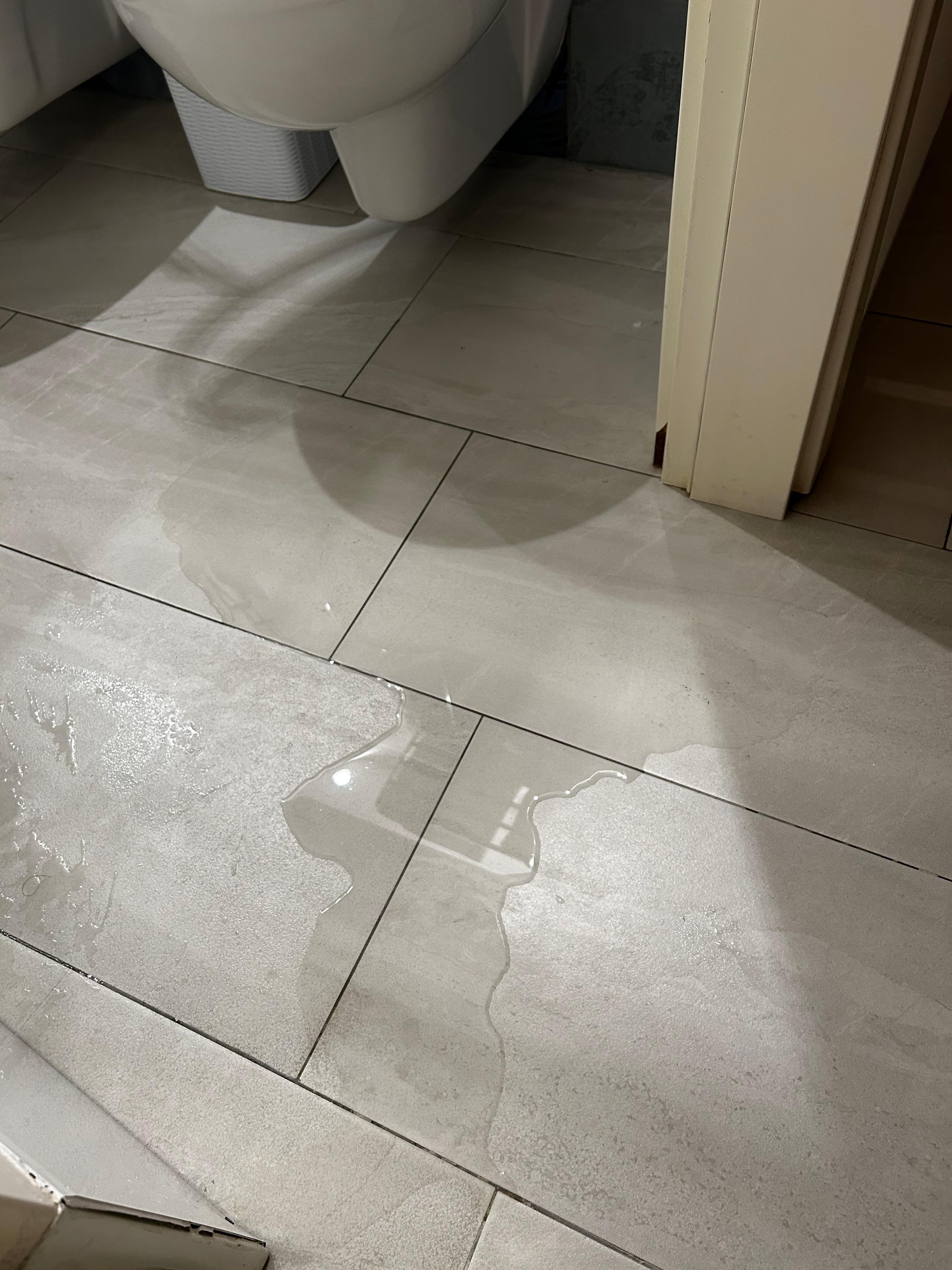 Flooded bathroom floor