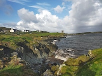 View on the house (middle house from the left) from the coast side.