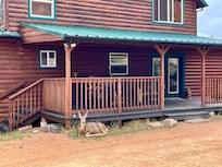 Deer hanging out by the deck.