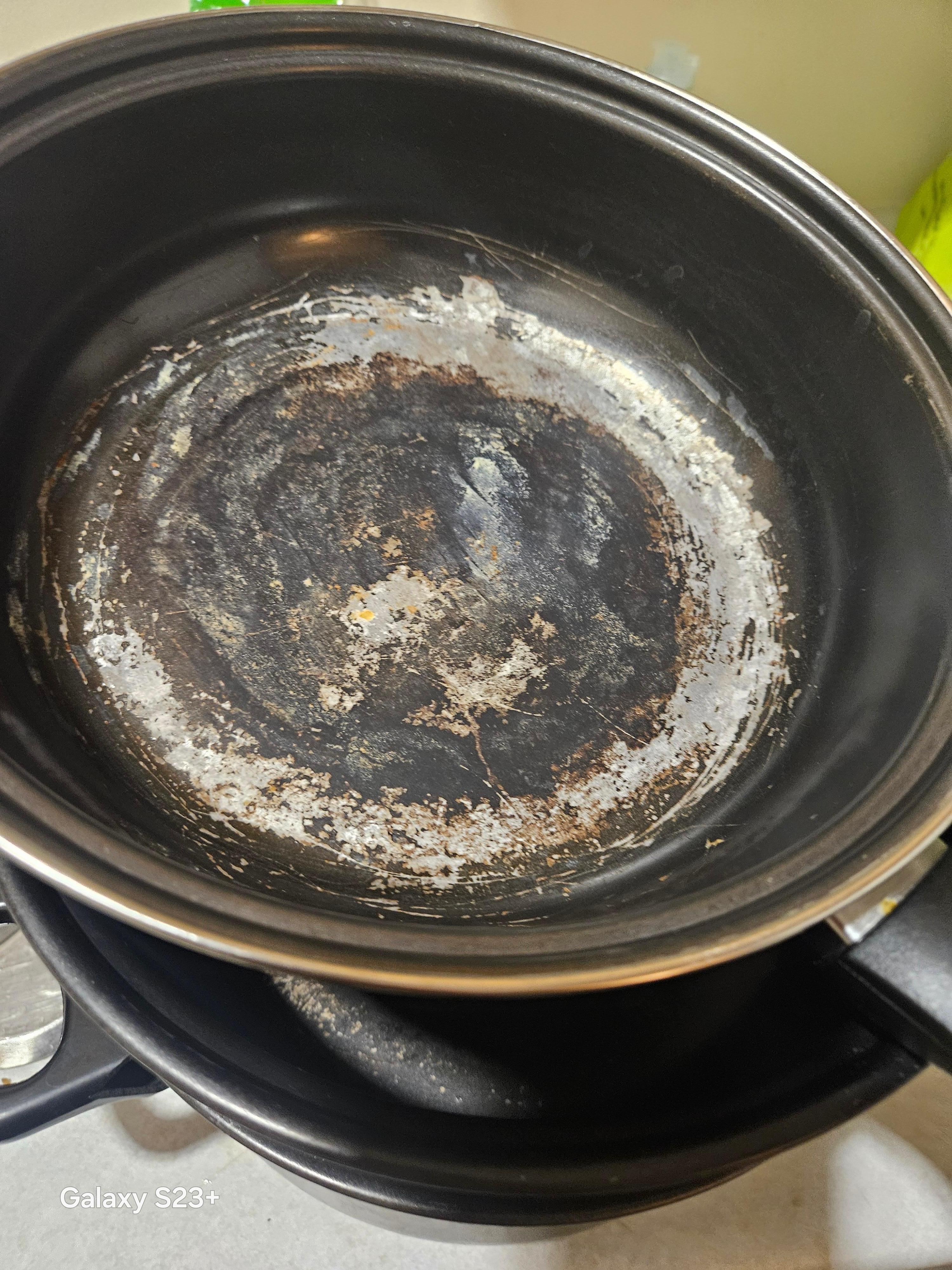 Burned pots that we tried to scrub  but were not useable