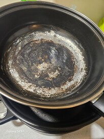 Burned pots that we tried to scrub but were not useable