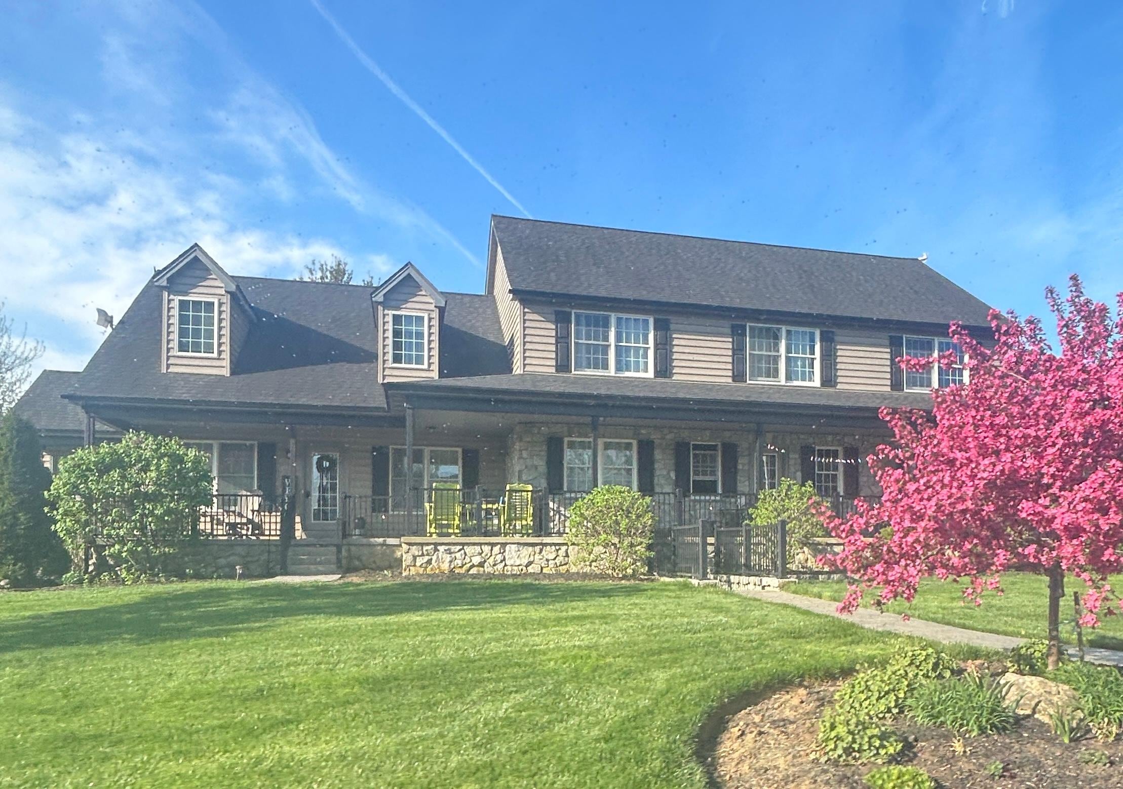 Guest house is on the left with view of the barn and silos. 