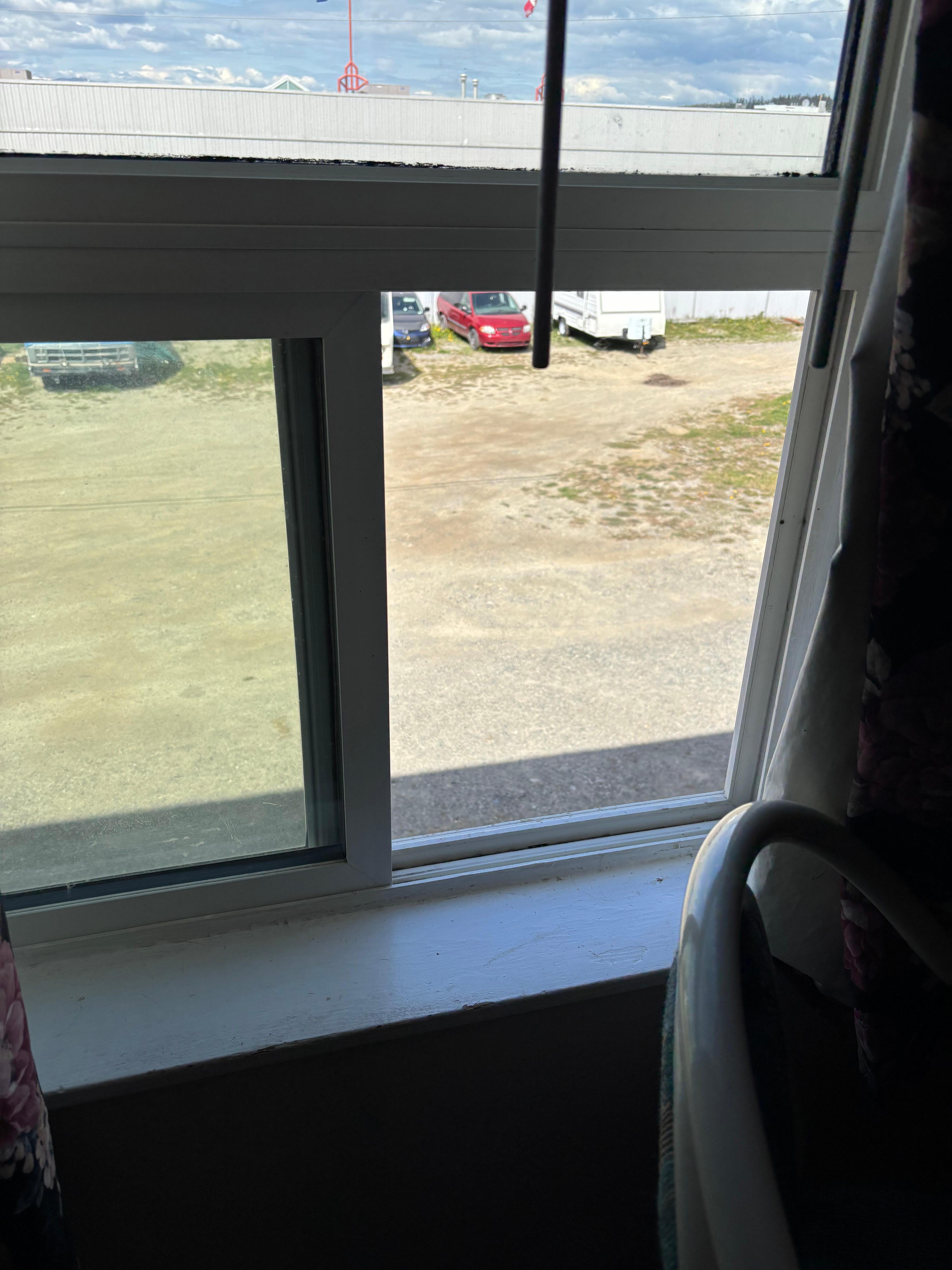 Curtains didn't close. No screen in the window with no air conditioner. The whole bldg had a horrid smell