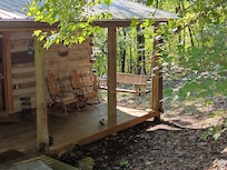 Front porch of the cabin, perfect for peaceful morning coffee