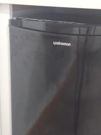 Damaged mini fridge