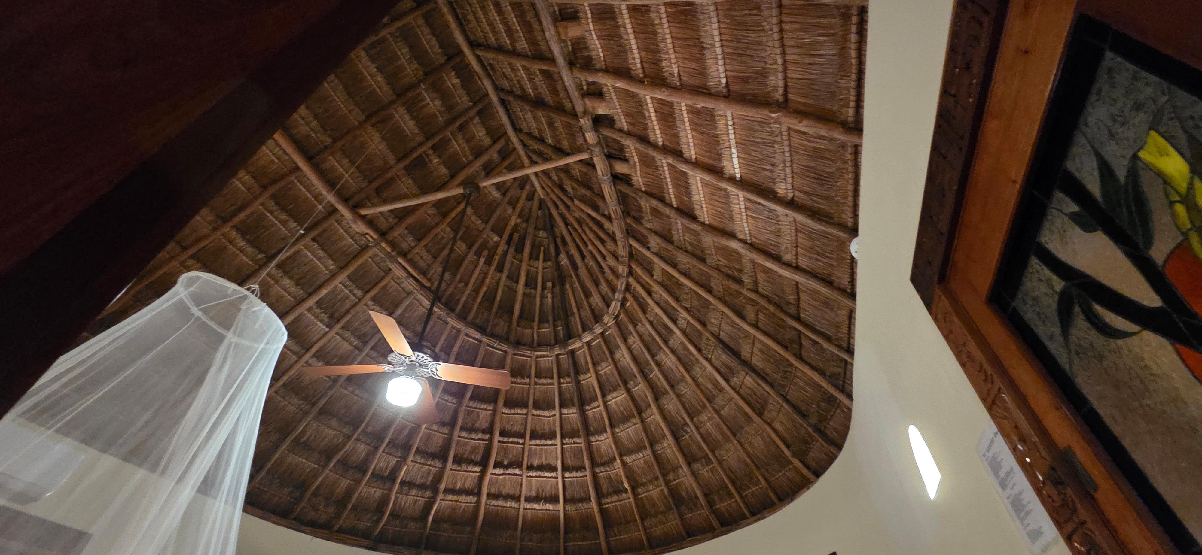 Thatched roof with fan