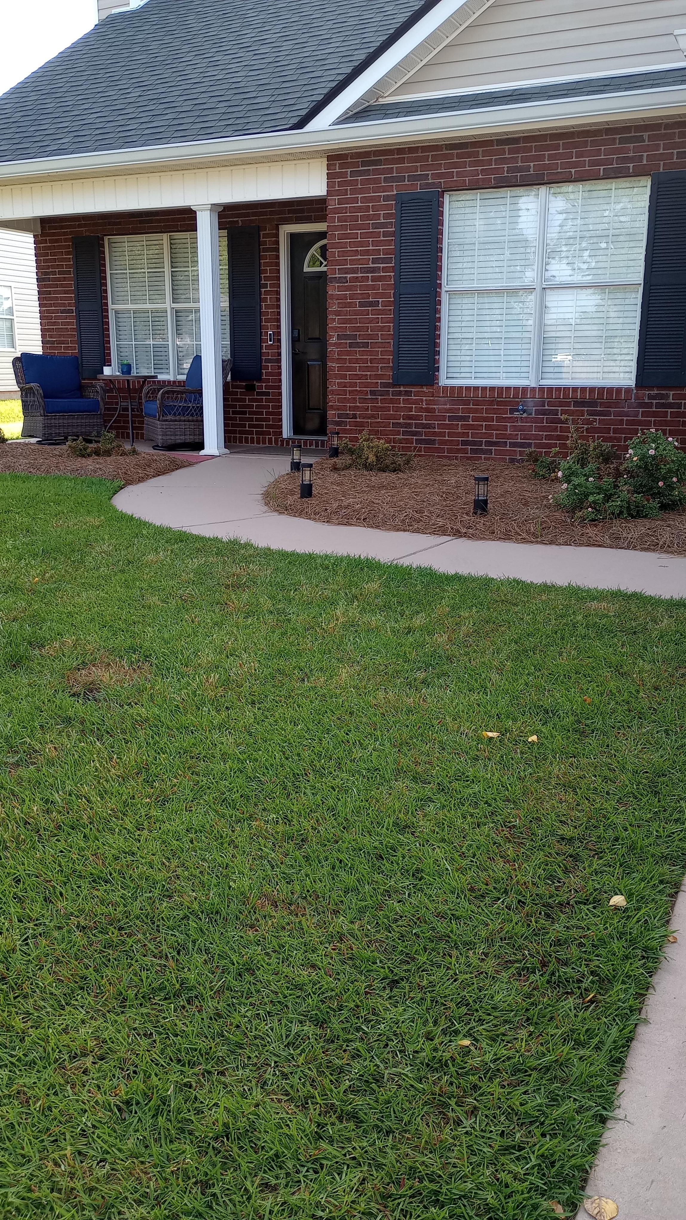 View of front porch where we enjoyed morning coffee!