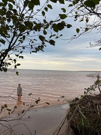 On the beach in front of the house