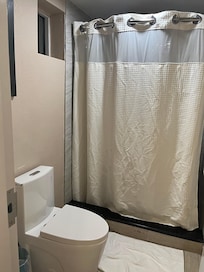 Water saving toilet and upgraded shower