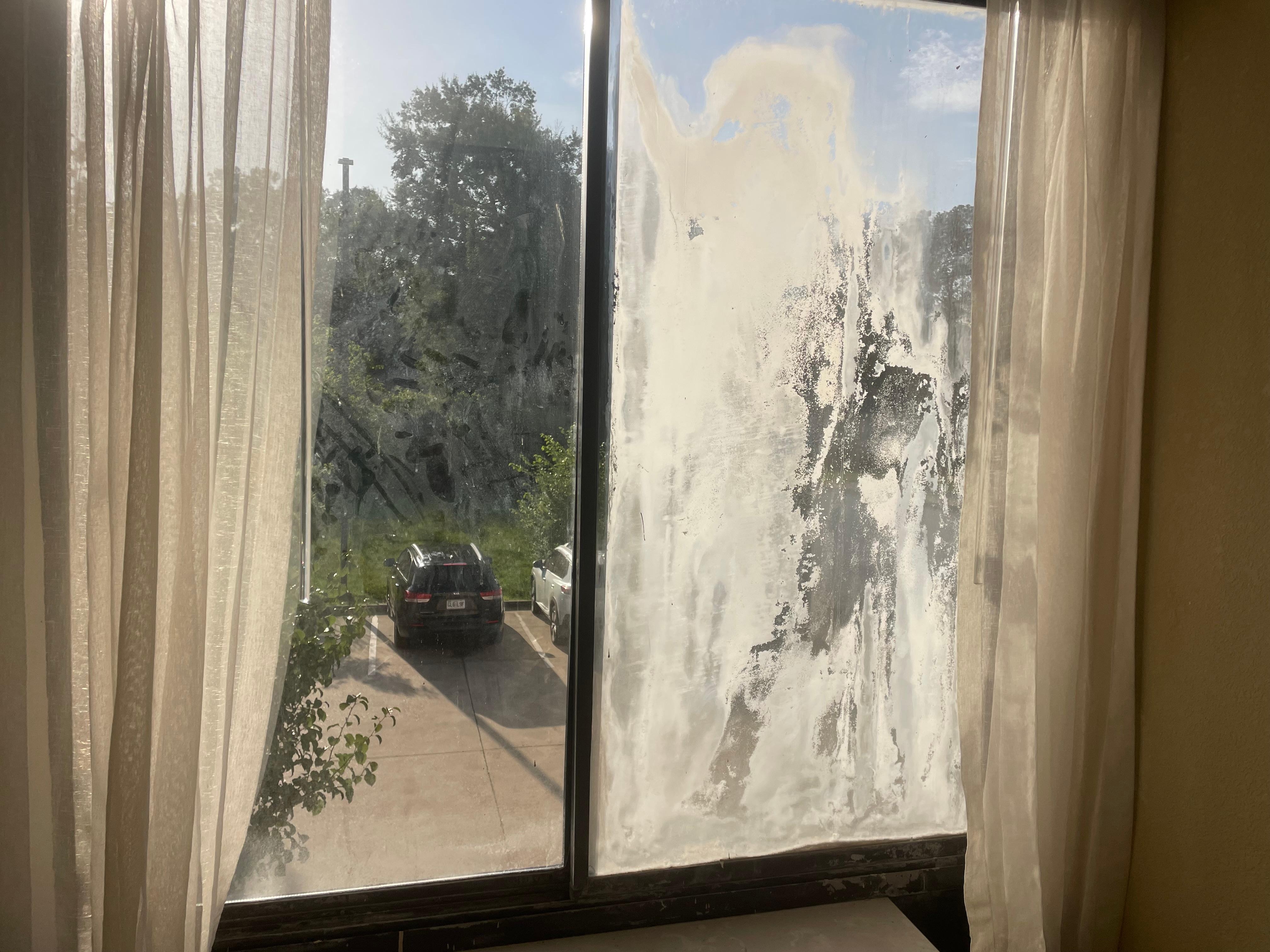 Corridor window example of run down building