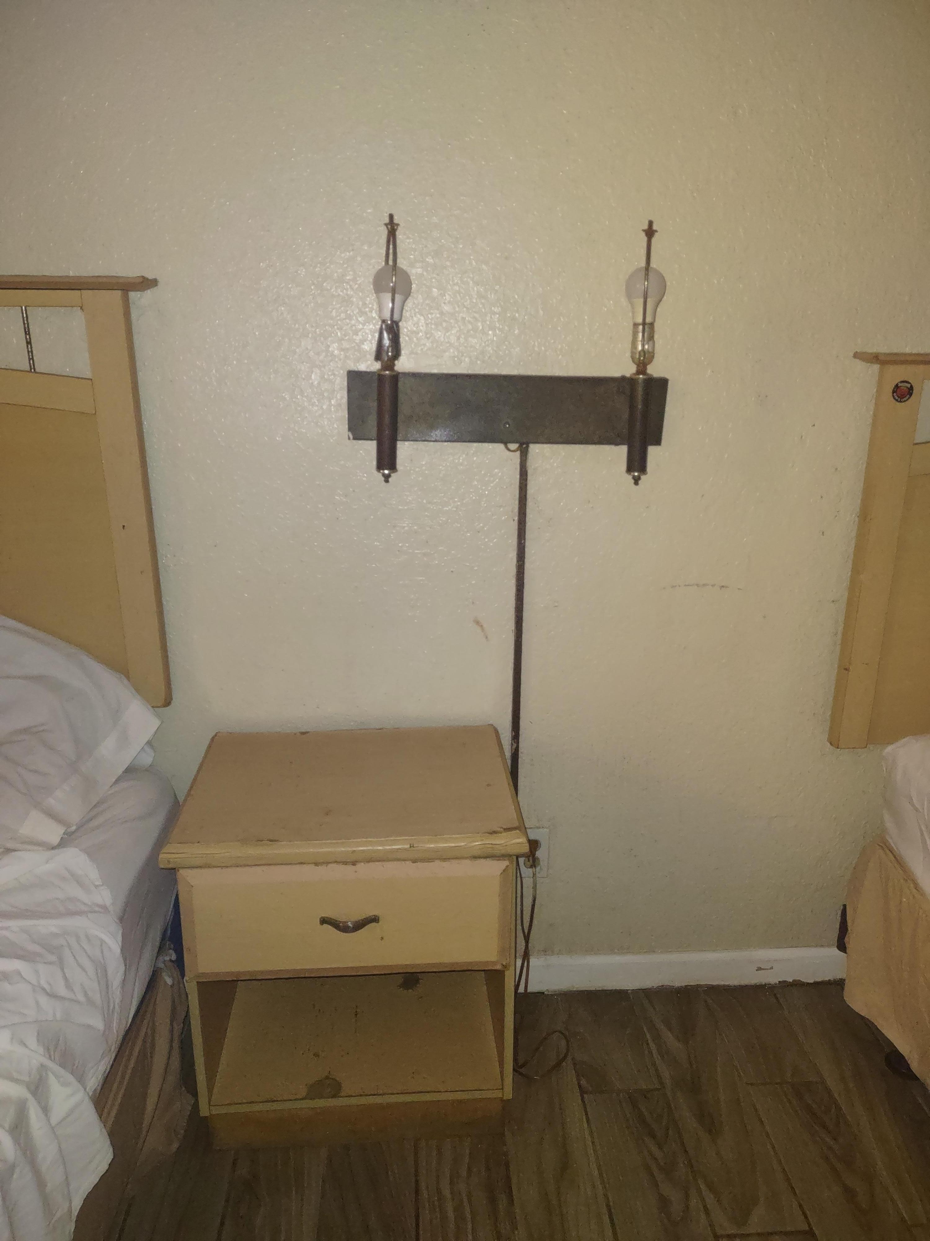 No lamp shades and the light on the right of the picture was flickering all night even though the switch was off