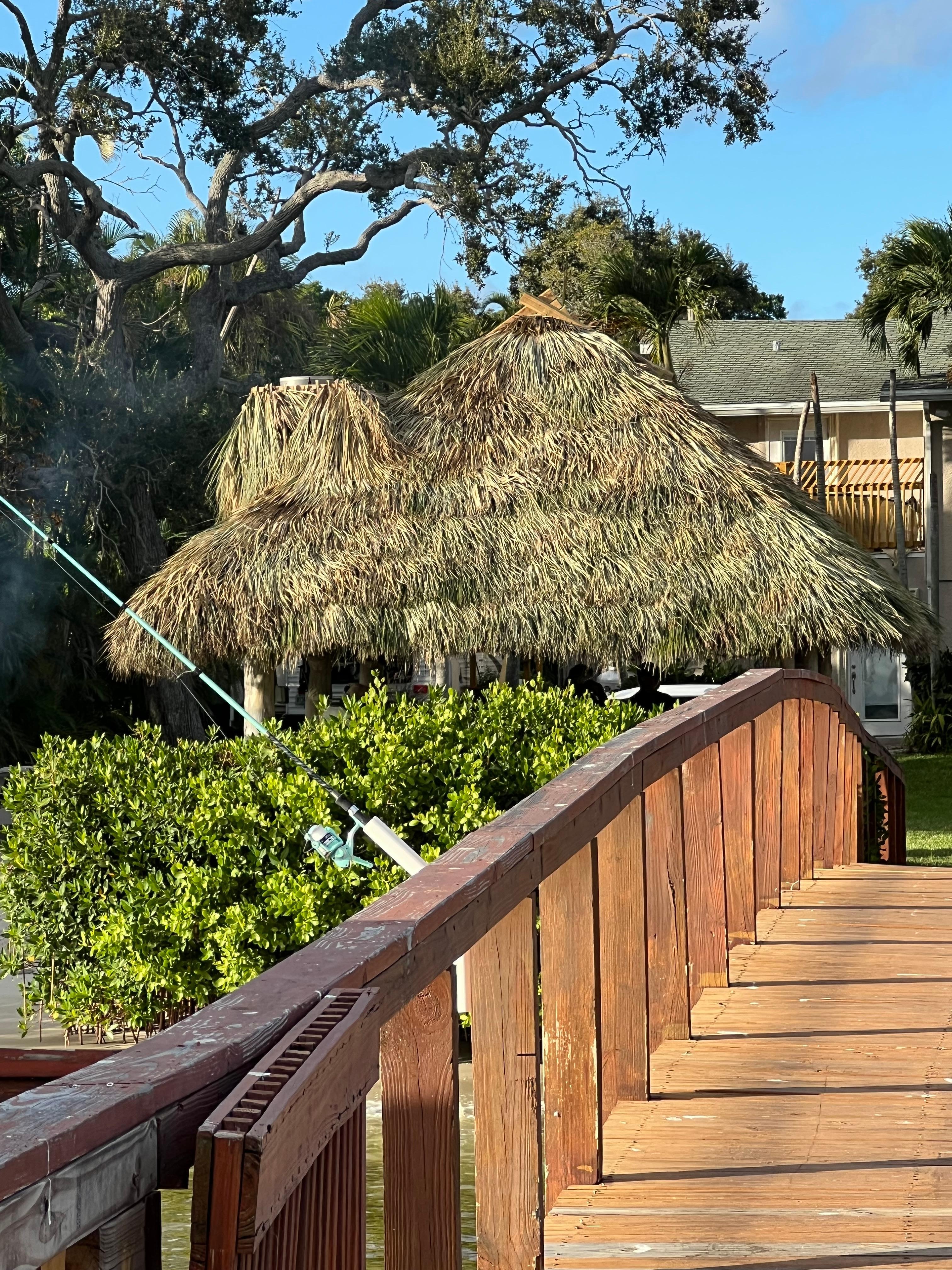 The tiki got a new roof while we were there, so interesting to watch it go on. 