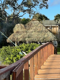The tiki got a new roof while we were there, so interesting to watch it go on.