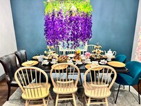 We could fit 10 people to the dining table comfortably. The chandelier was perfect for hanging wysteria to give the best Bridgerton vibes!