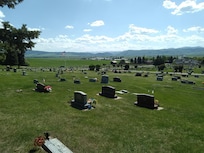 Memorial Day honors at Afton cemetery with Star Valley behind