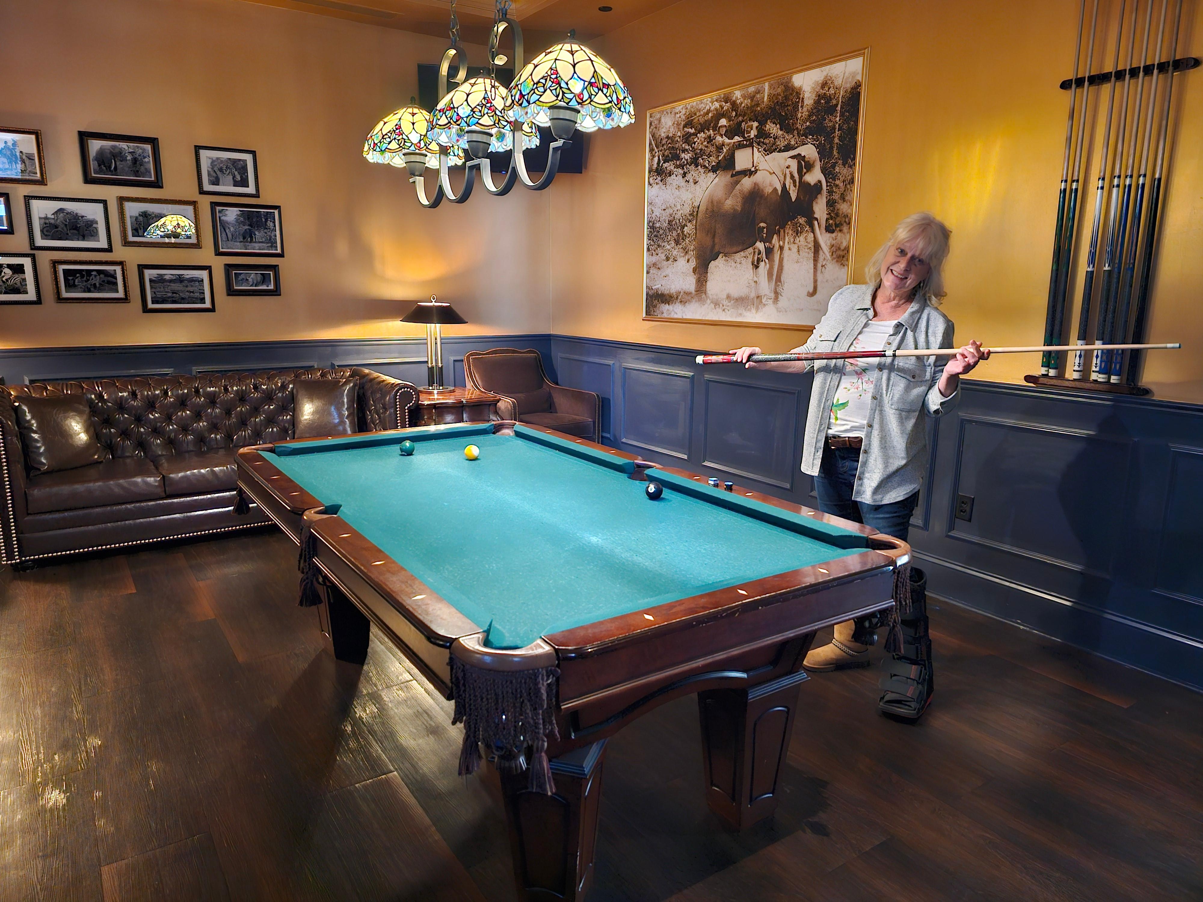 The vintage billiards room connected to the hotel bar.