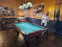 The vintage billiards room connected to the hotel bar.