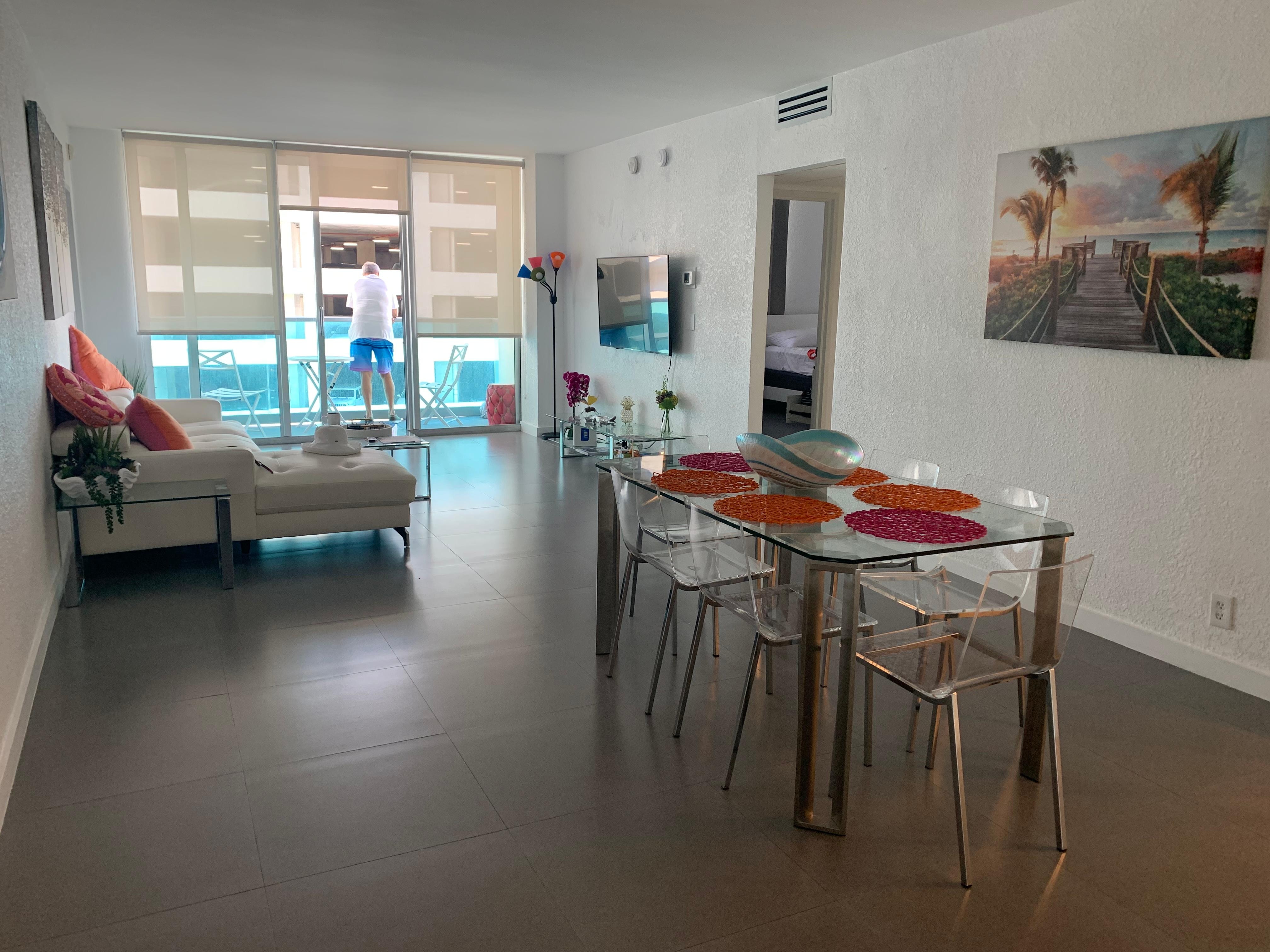 Dining room/ living room/ sliding door to patio, simply furnished, new, clean, adequate 