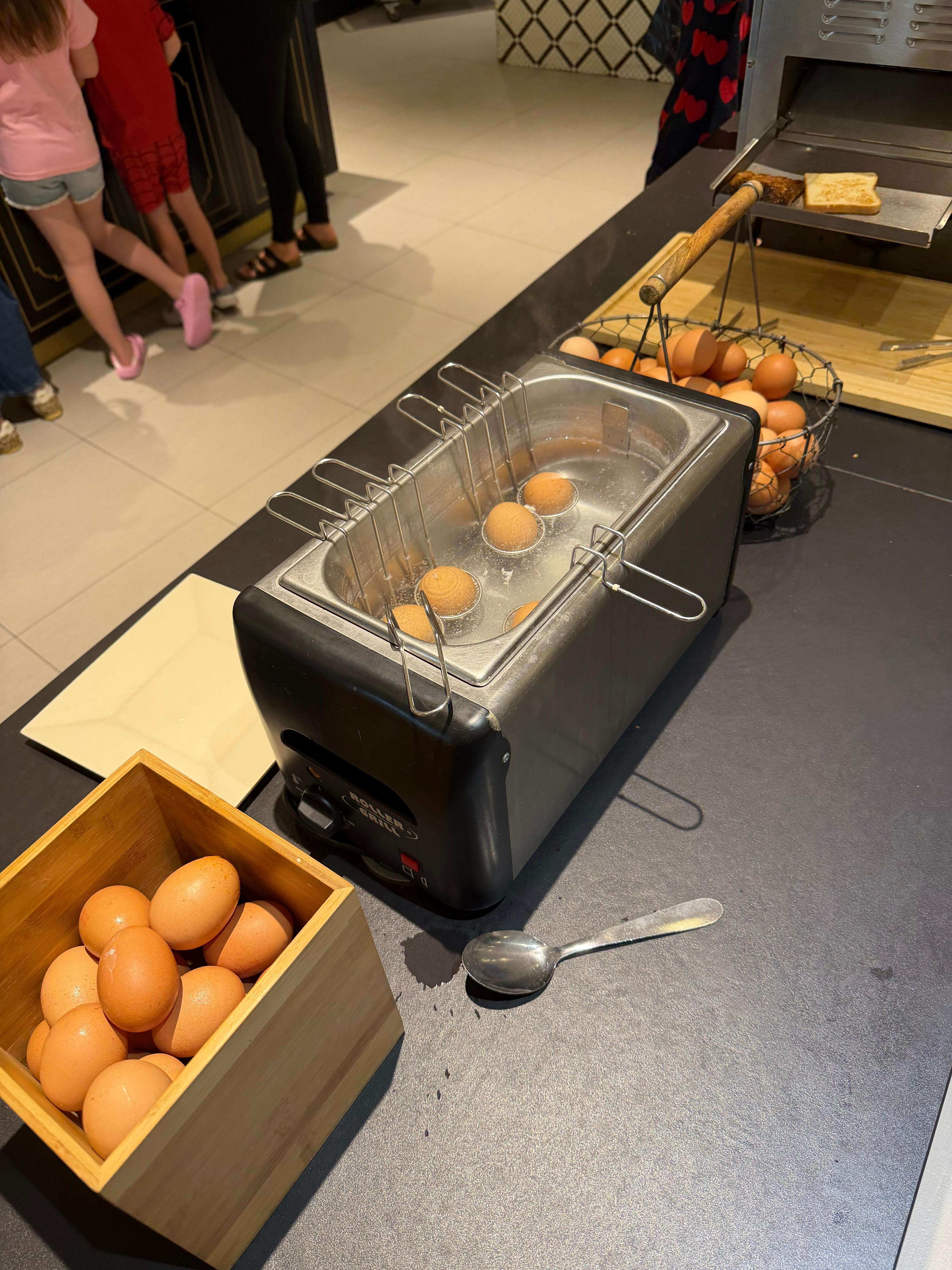 They serve your raw eggs that you will have to stand in line and cook yourself in a little tiny pot a single one available