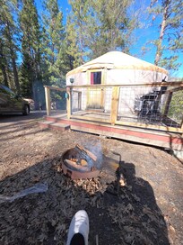 Front of our Yurt, patio and grill.