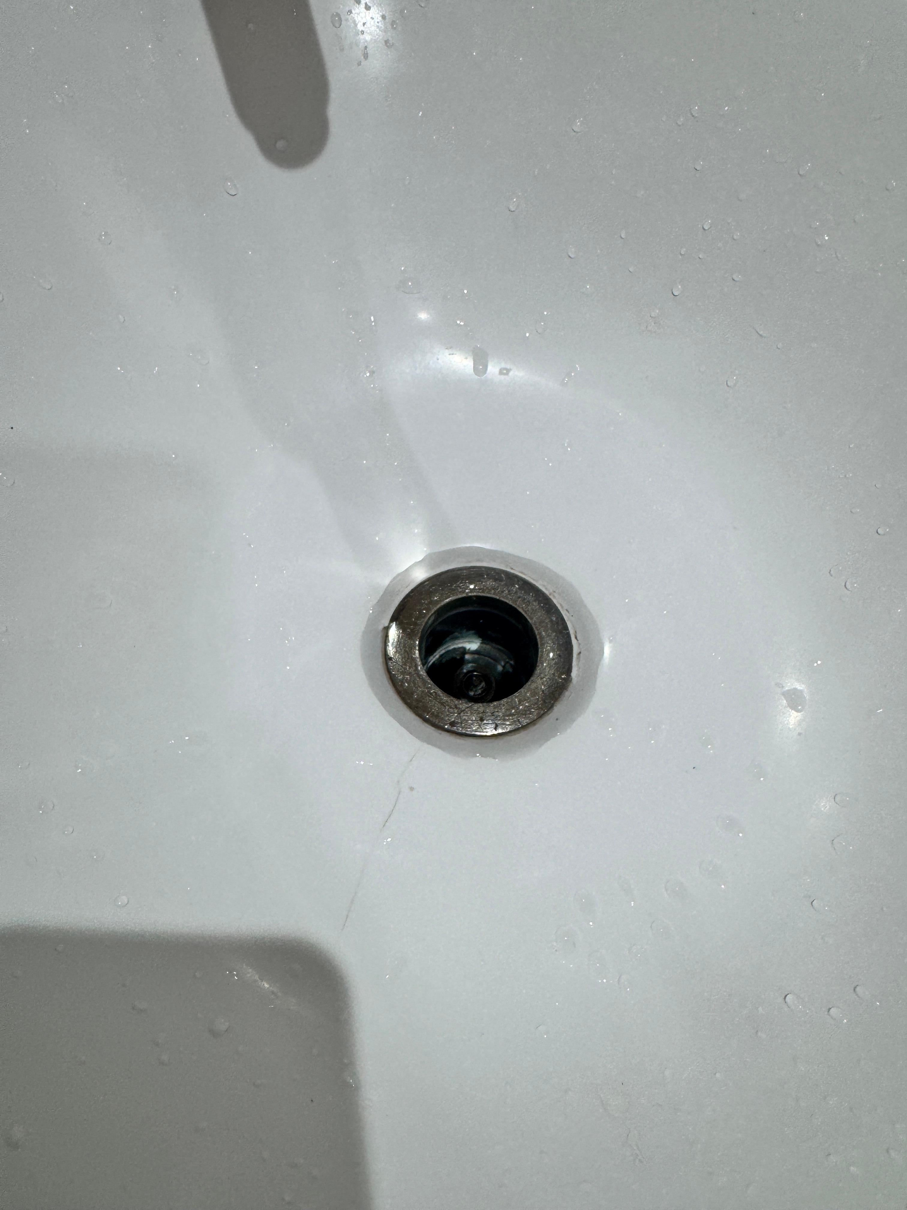 First room - missing sink plug. Pipe also backed up.
