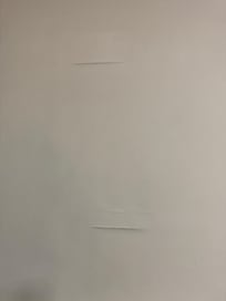 Paper peeling off walls