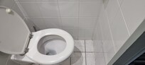 Cramped toilet