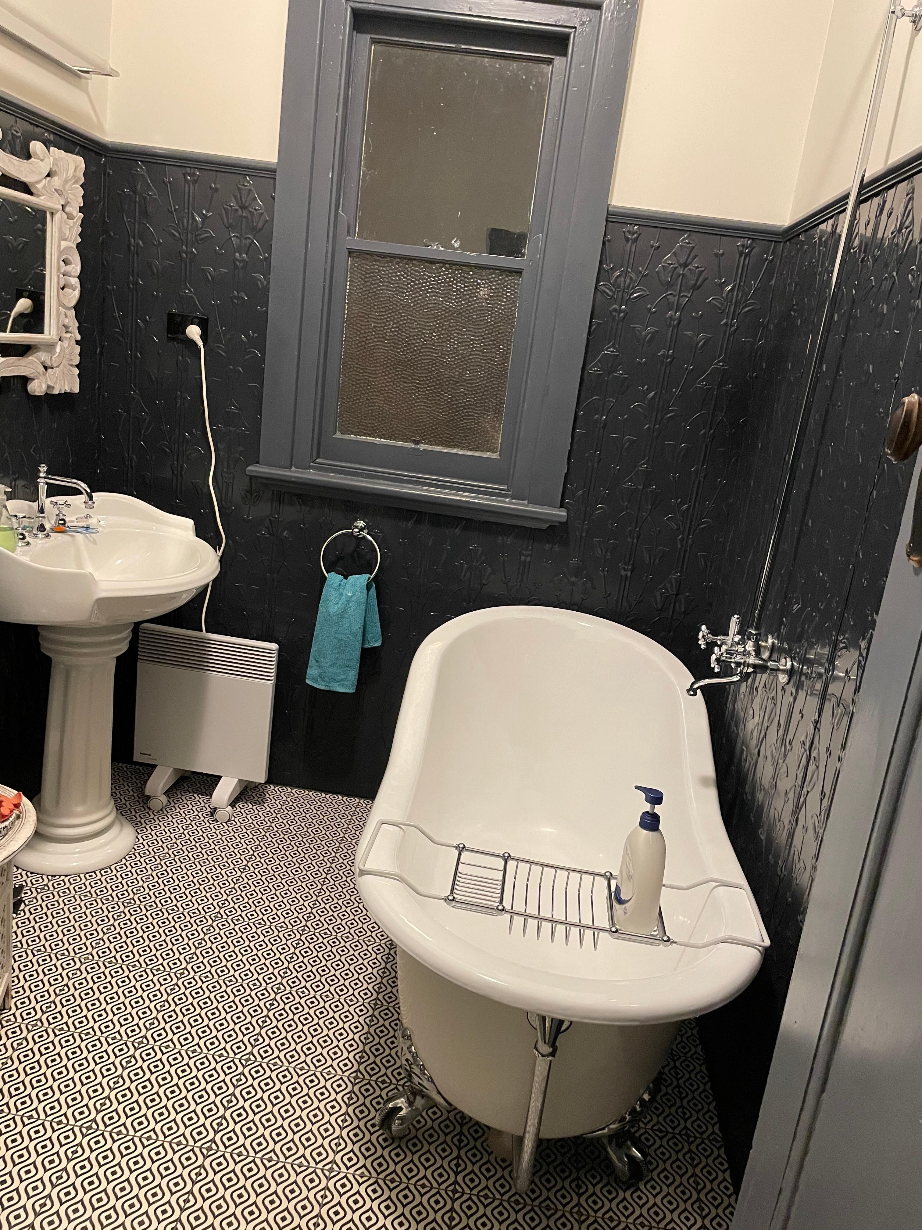 One bathroom. 2nd bathroom has an ensuite walk in shower off the bedroom 