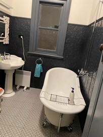 One bathroom. 2nd bathroom has an ensuite walk in shower off the bedroom