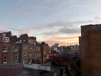 View outside kitchen window. London Eye and the Shard (not shown) in distance.