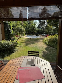 View from shaded terrace by kitchen