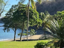 Looking toward the beach that is in front of the restaurant and pool