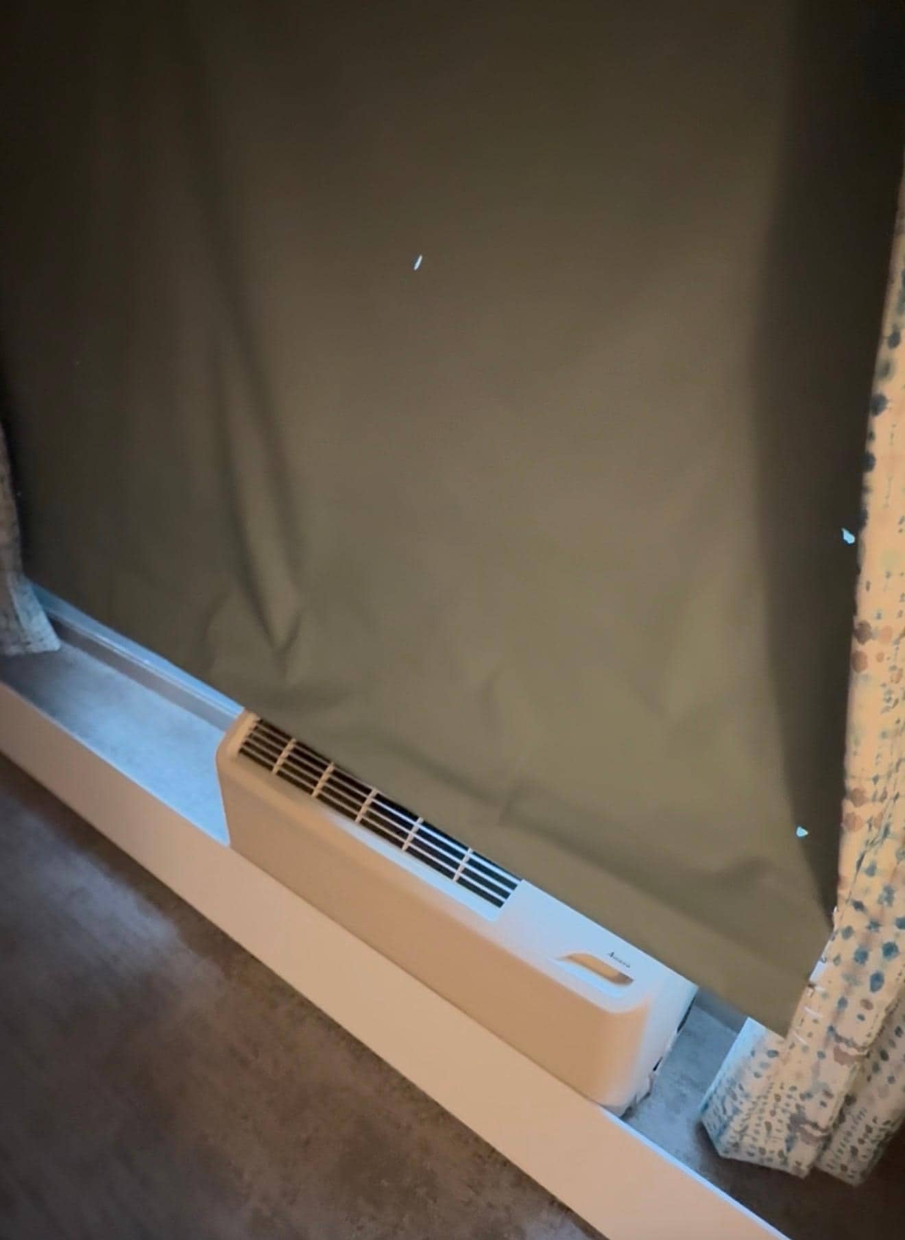 Curtain and piece of metal that fell in my grandson