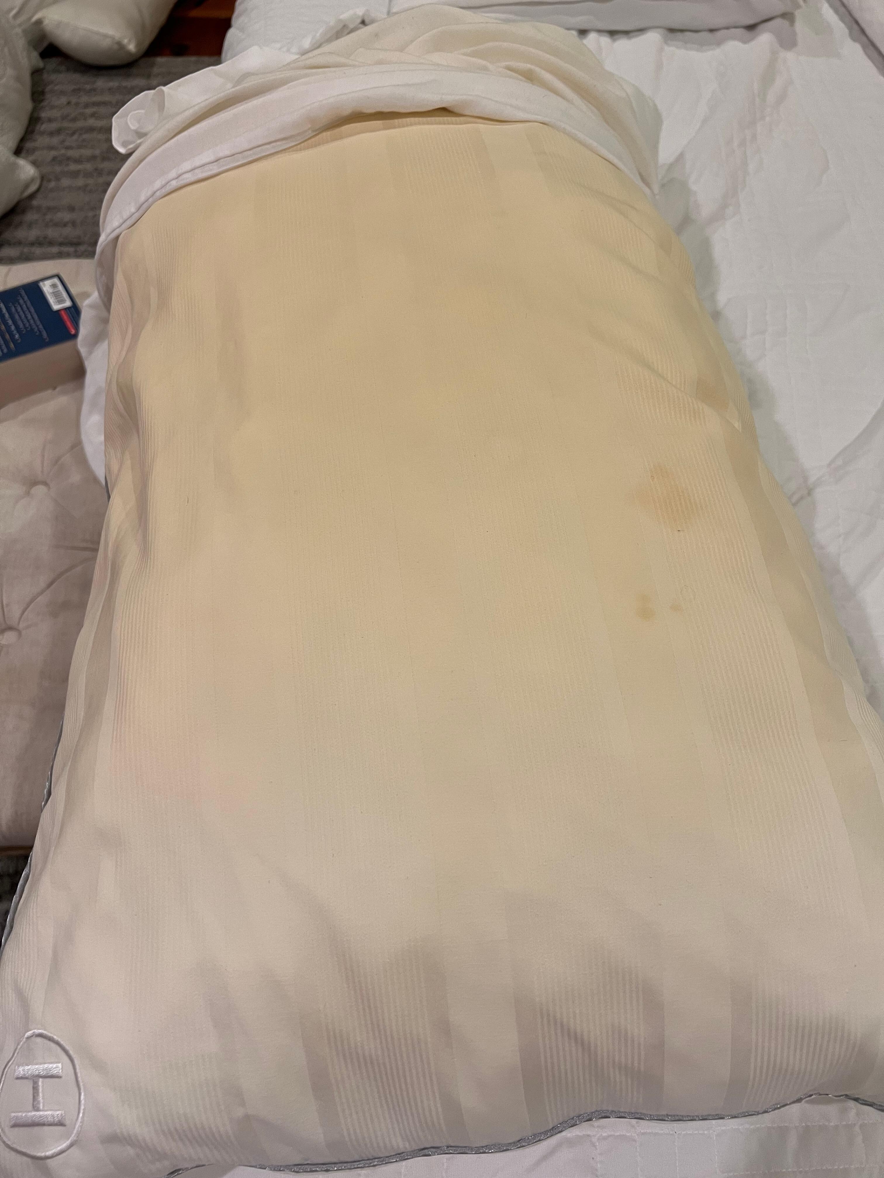 Yellow, soiled pillow-this was on all beds too. Fresh pillows from Walmart are affordable! 