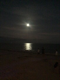 The full moon at the beach that evening.