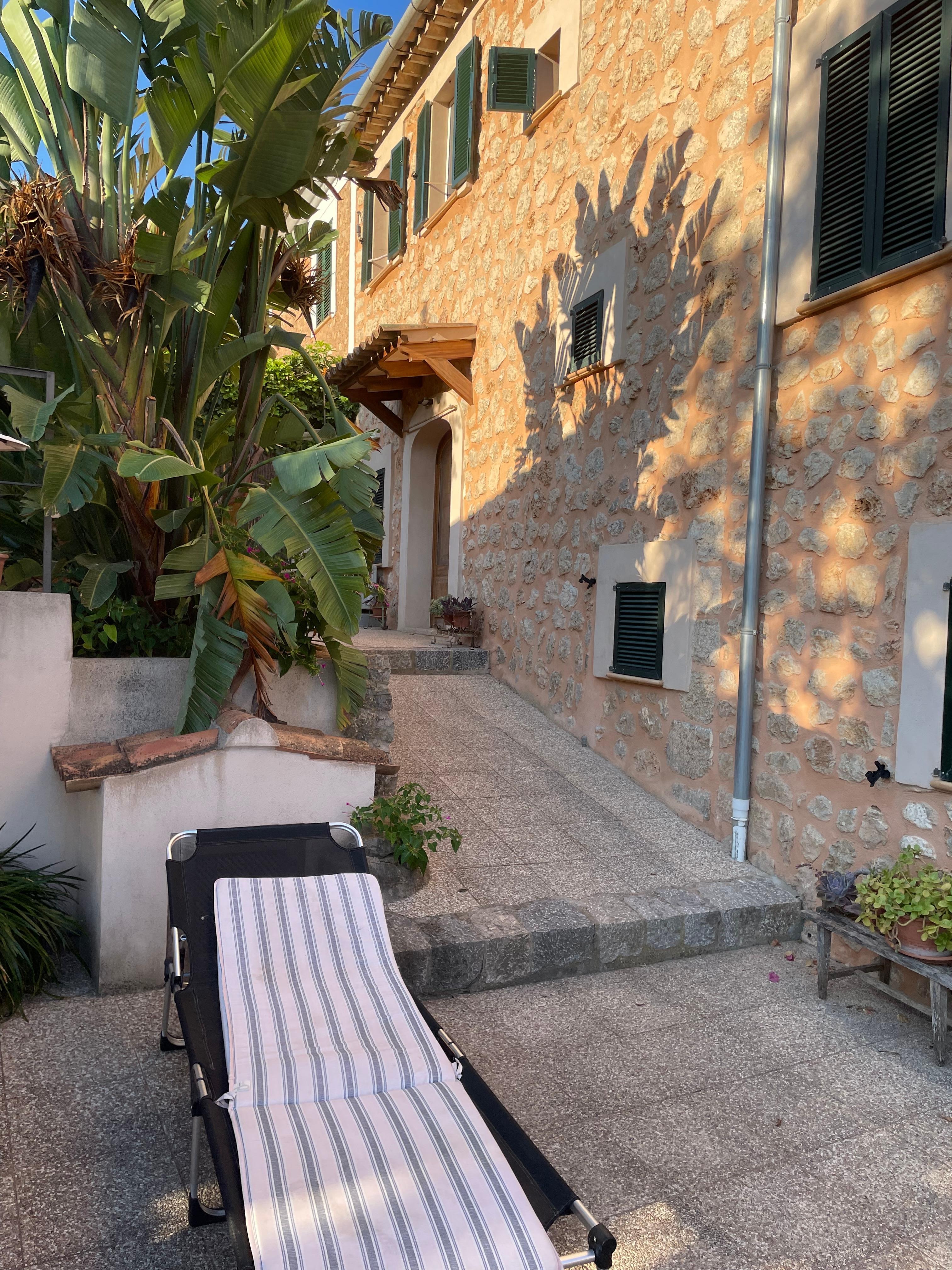 Outside on the terrace at the house